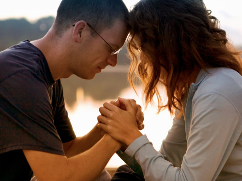 Couple,Praying,Together